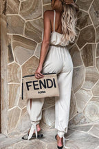 Stunncal Pocketed Satin Wrap Jumpsuit